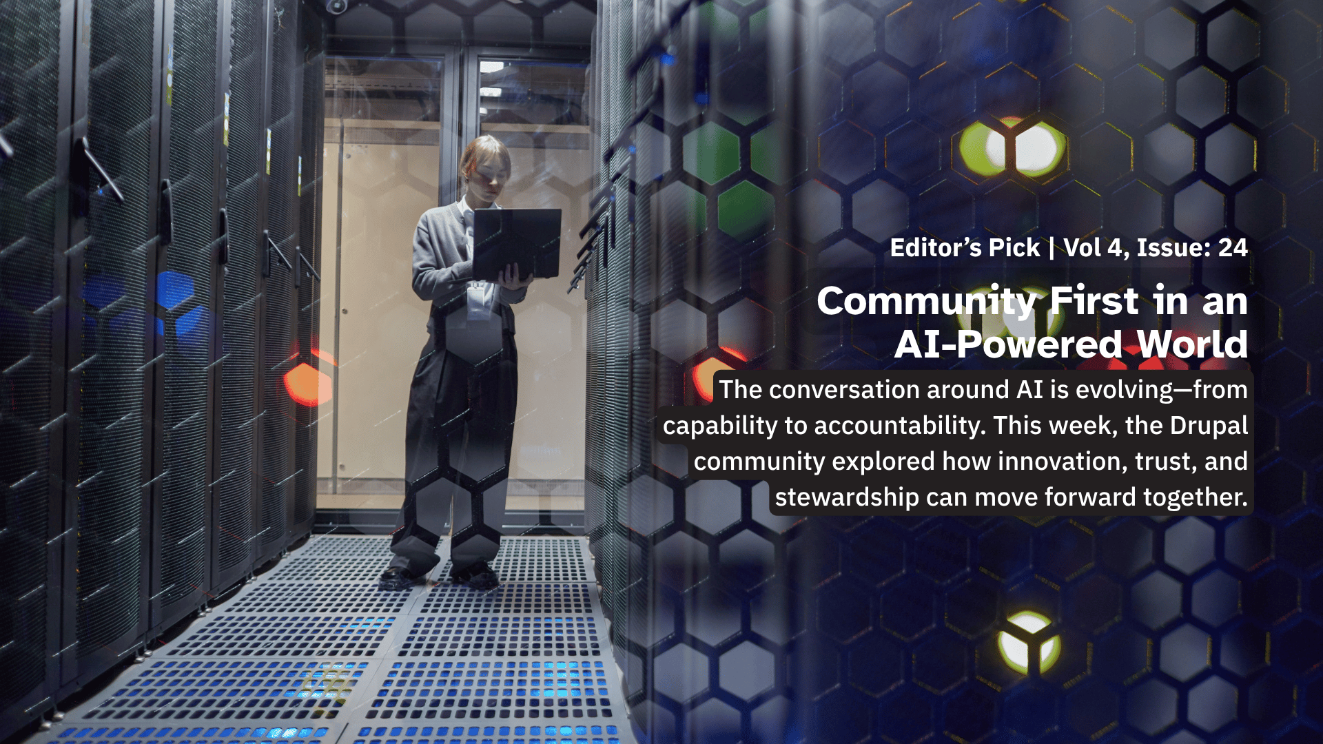 Person standing in a data center aisle holding a laptop, surrounded by server racks illuminated by colored lights.