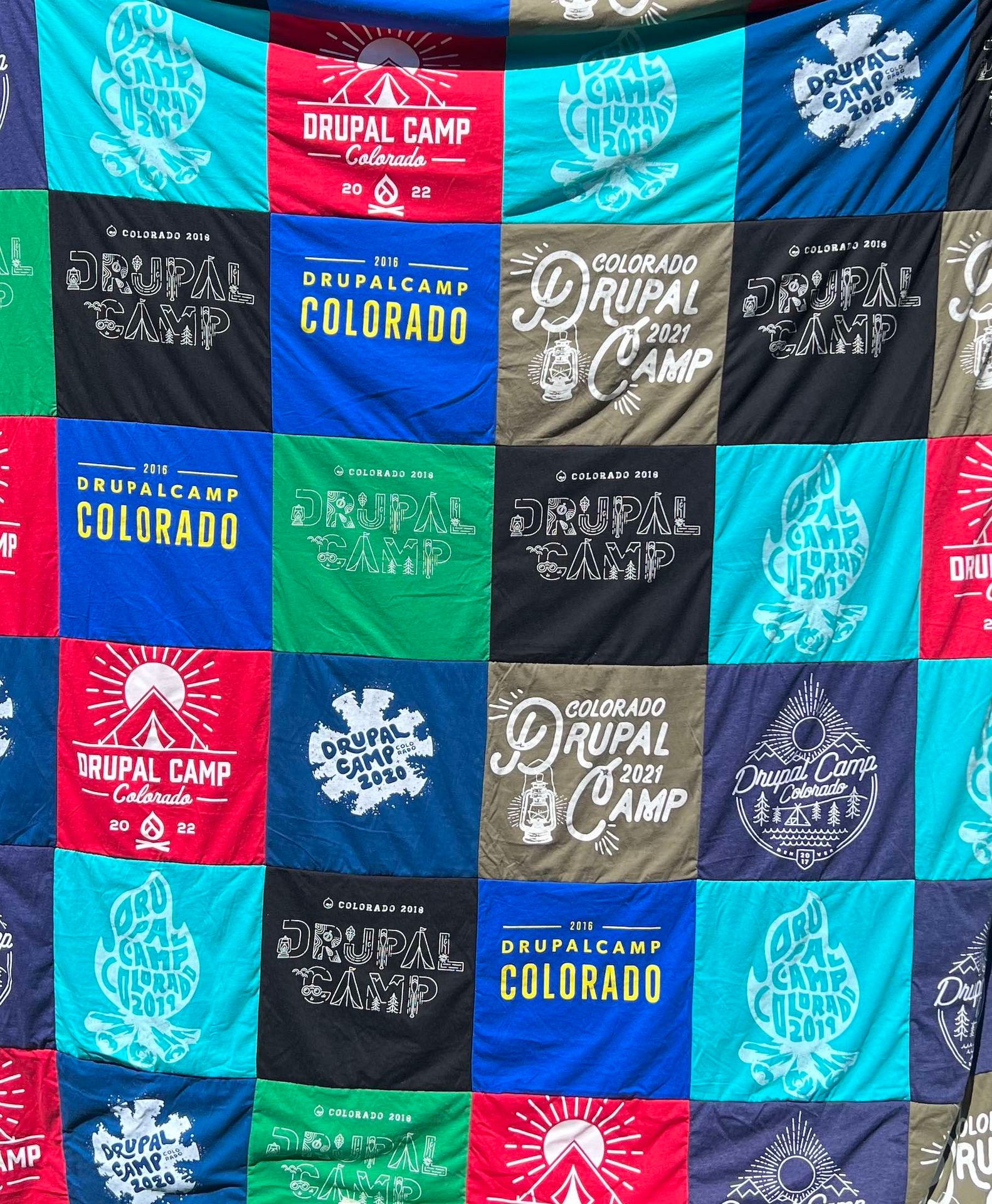 Quilt made with previous years' DrupalCamp Colorado hoodies