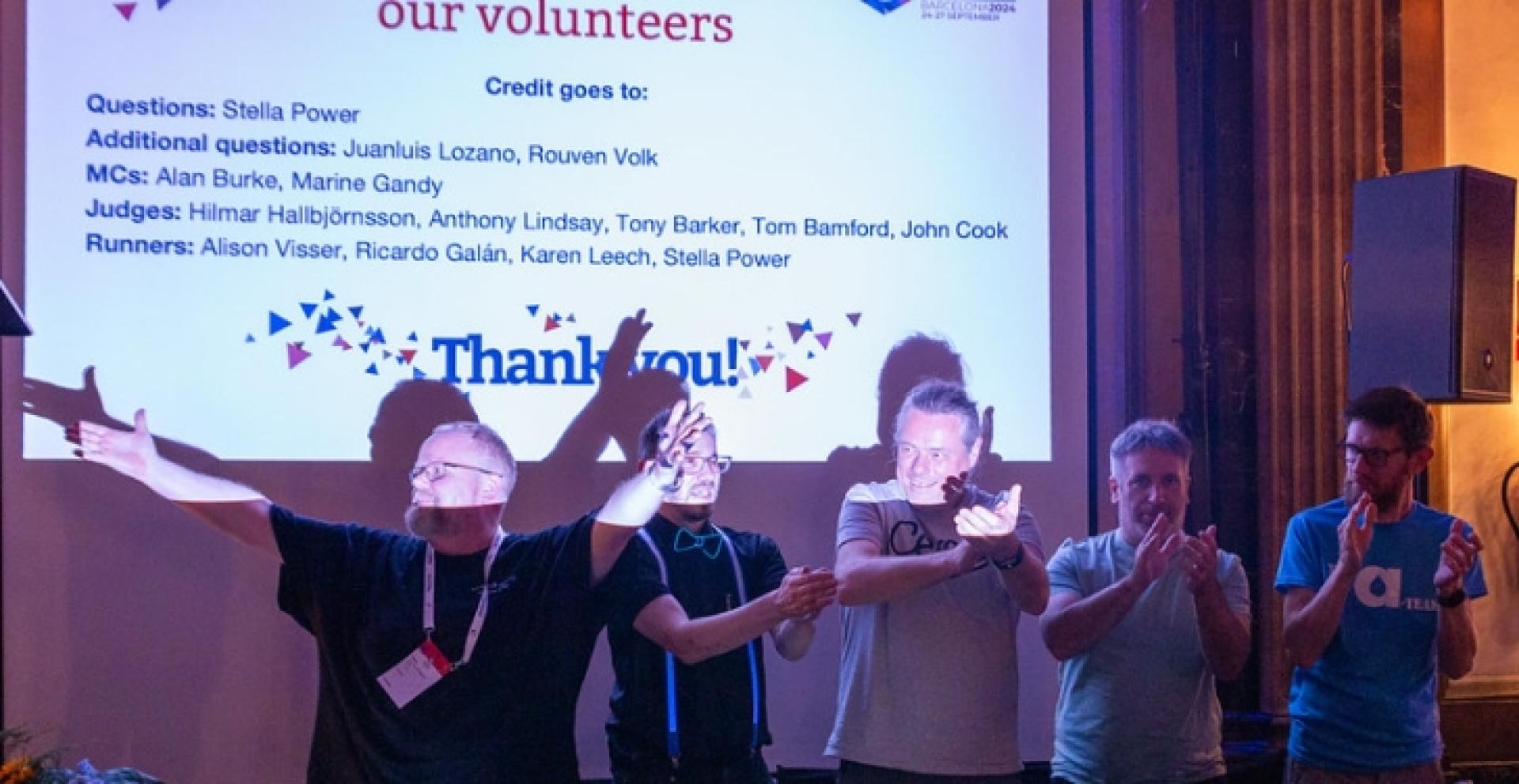 Trivia Night judges Hilmar Hallbjörnsson, John Cook, Anthony Lindsay, Tony Barker and Tom Bamford applaud the volunteers (including themselves). Photo by Philippe von Bergen