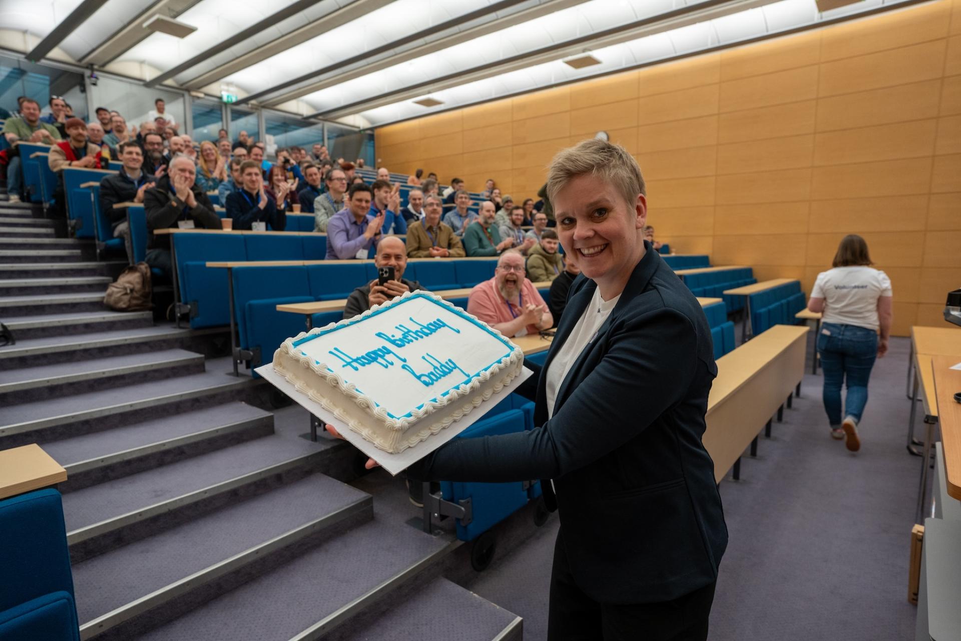 Baddy Sonja Breidert, CEO and Co-founder at 1xINTERNET and a member of the Drupal Association Director Board with a surprise birthday cake presented to her while on the camp Baddy Sonja Breidert, CEO and Co-founder at 1xINTERNET and a member of the Drupal Association Director Board with a surprise birthday cake presented to her while on the camp