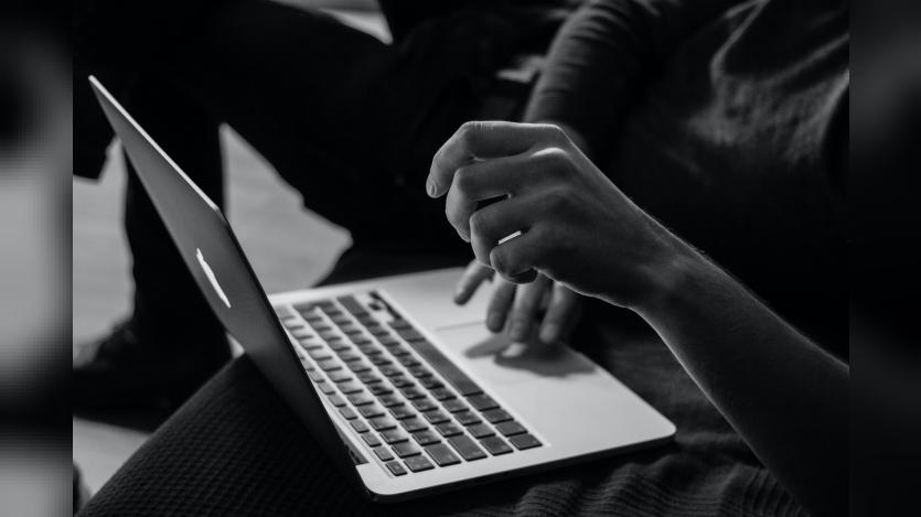 a person working in laptop