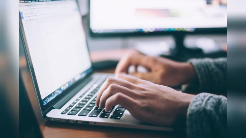 a person working in laptop