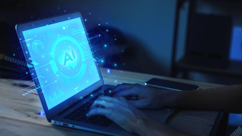 person using laptop using artificial intelligence