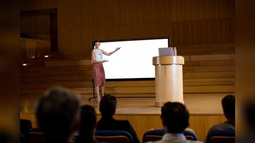 female business executive giving presentation