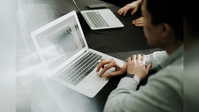 a person working in laptop