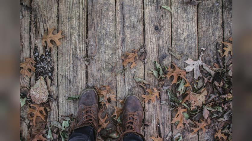 Man standing on a wooden deck