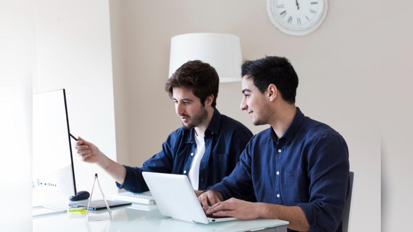 Colleagues discussing work project