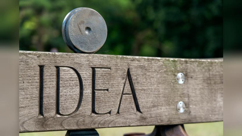 Idea etched on to wood