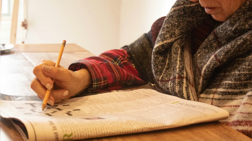 Woman doing crossword
