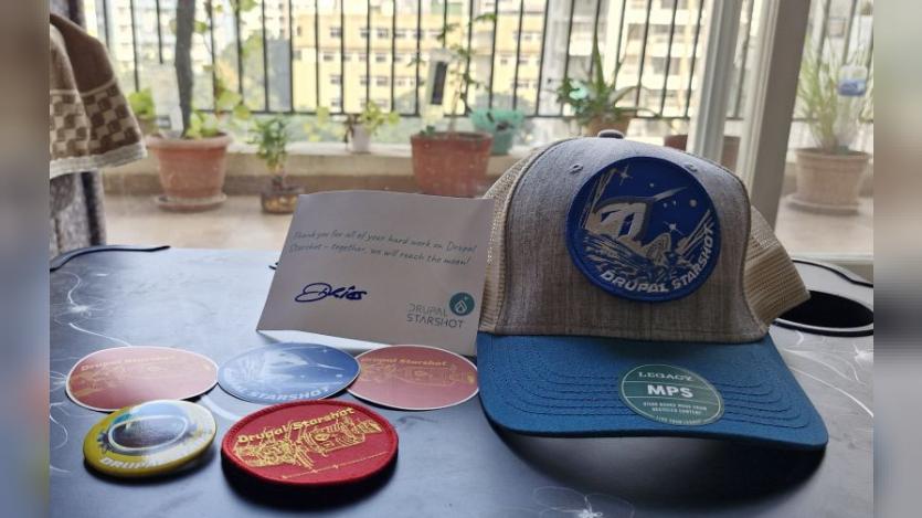 A cap, Starshot stickers, letter from Dries Buytaert