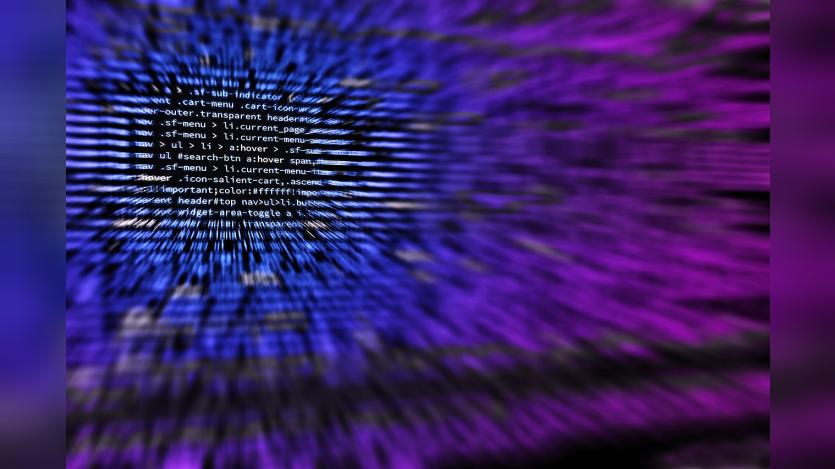 A blurred image of codes displayed on a screen