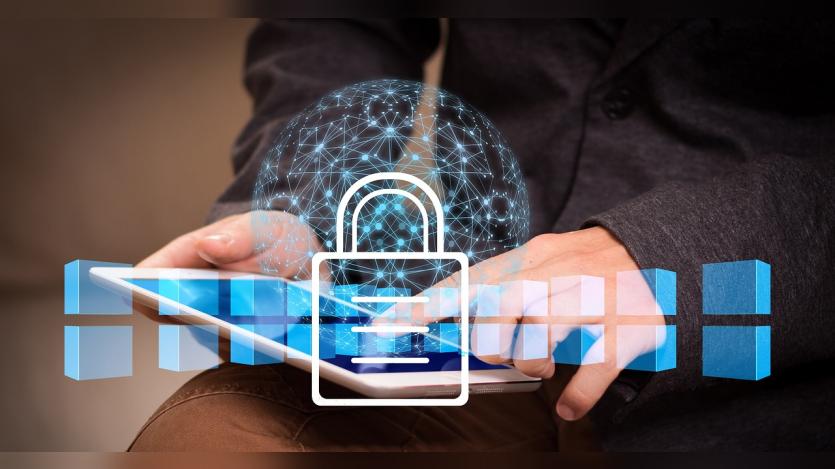 A man browsing internet and a security lock logo