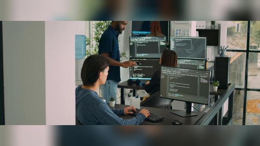 Developer writing coder on computer