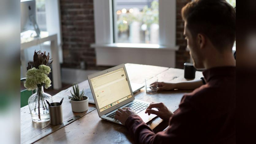 Man at a laptop in an office
