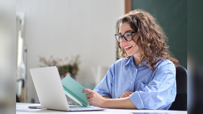 woman looking at paper