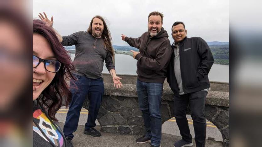 A selfie a selfie with 4 people in it