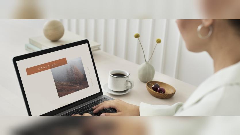 Woman looking at laptop