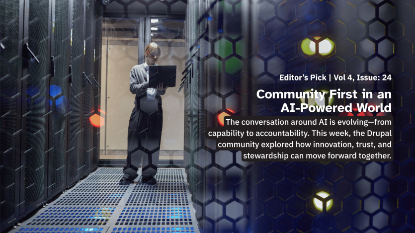 Person standing in a data center aisle holding a laptop, surrounded by server racks illuminated by colored lights.
