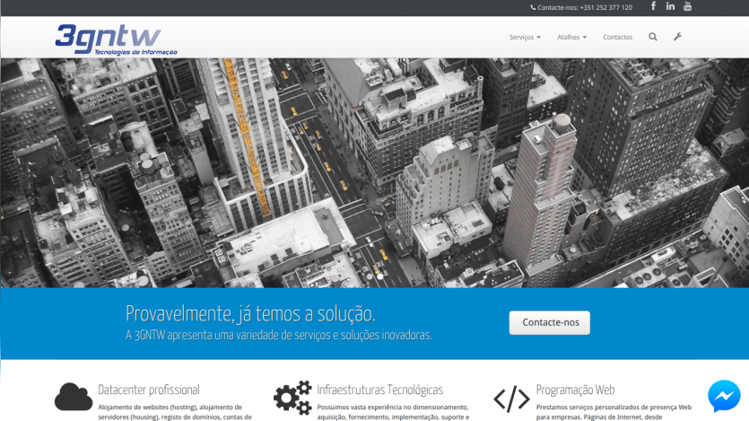 Website homepage with aerial cityscape background, headline about providing solutions, and a contact button.