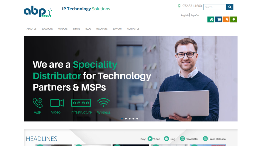 Homepage of ABP Technology showcasing their services with a smiling man holding a laptop.