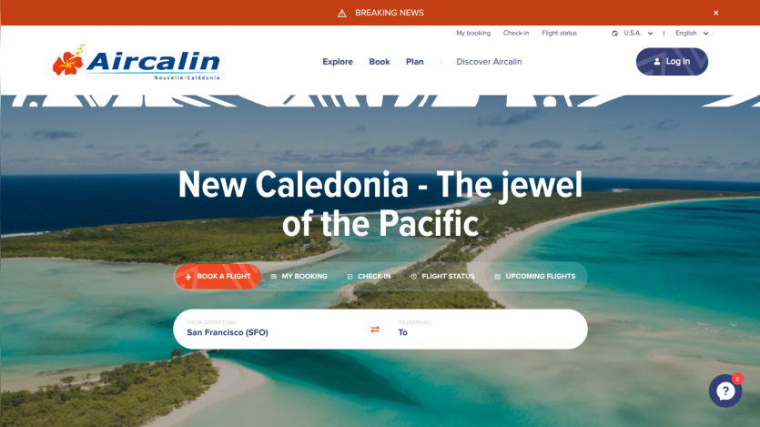 Aircalin homepage with tropical island background, headline promoting New Caledonia, and flight booking options