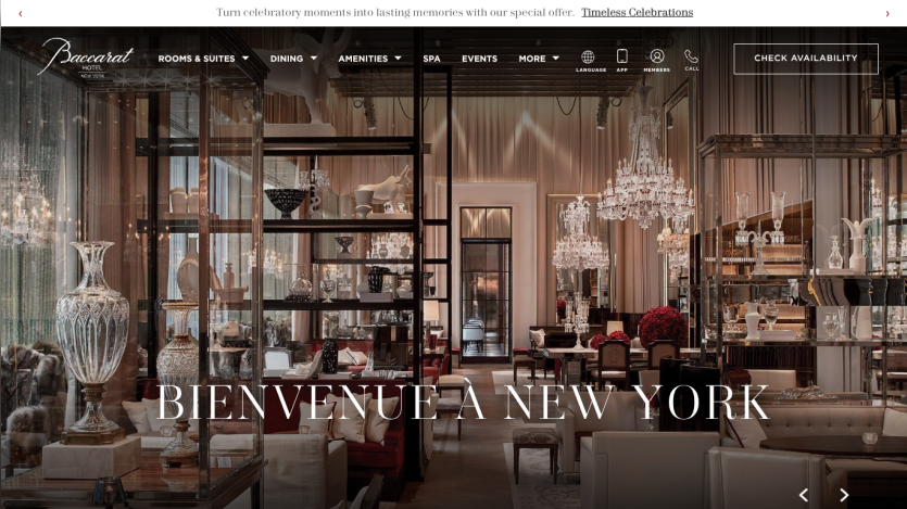 Luxurious Baccarat Hotel New York lobby with crystal chandeliers and elegant decor welcoming guests