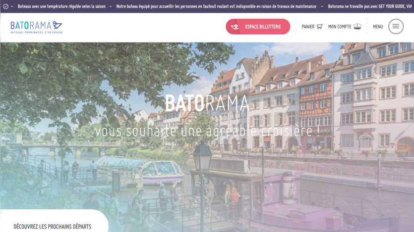 Batorama website offering boat tours in Strasbourg with booking button and scenic river view