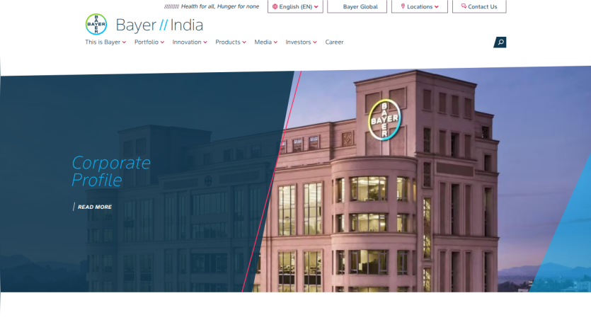 Bayer India website homepage with corporate profile highlight and building image under evening sky