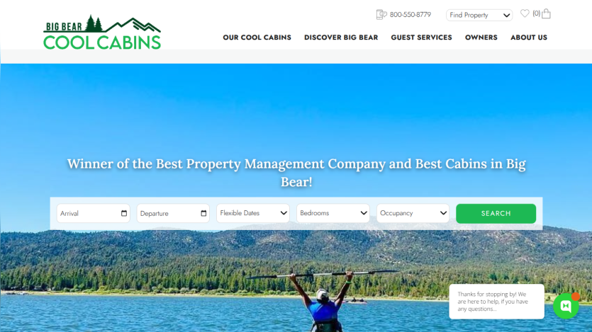 Website for Cool Cabins featuring a scenic view and search options for cabin rentals.