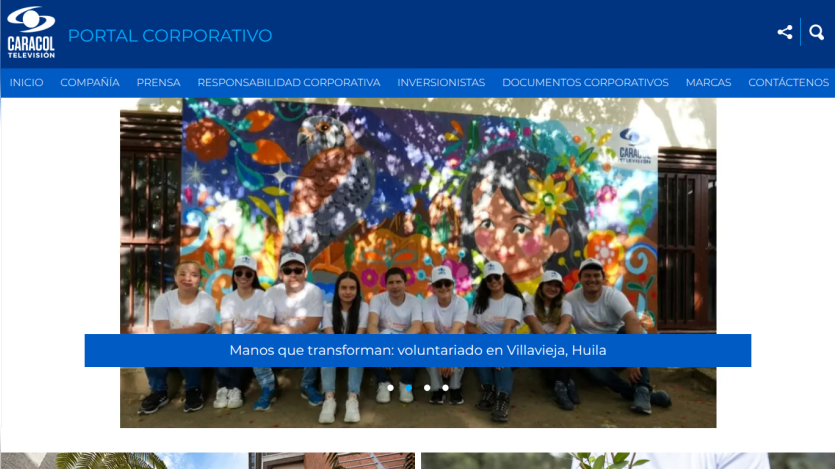 Corporate portal homepage featuring a colorful mural and a group of volunteers in front.