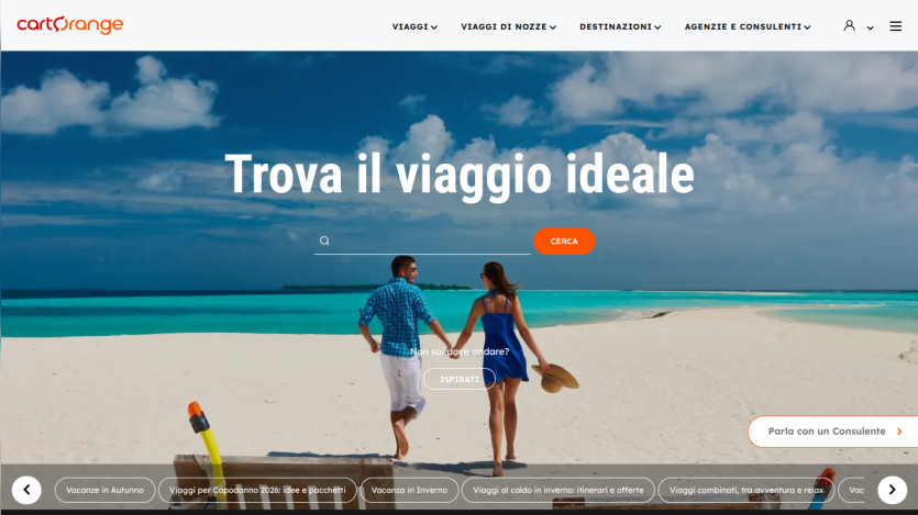Travel website homepage with search bar and options for autumn, winter, and combined trips over scenic coastal background