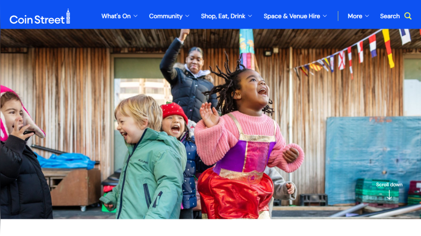 Coin Street website header with navigation and a hero image of children playing joyfully outdoors.