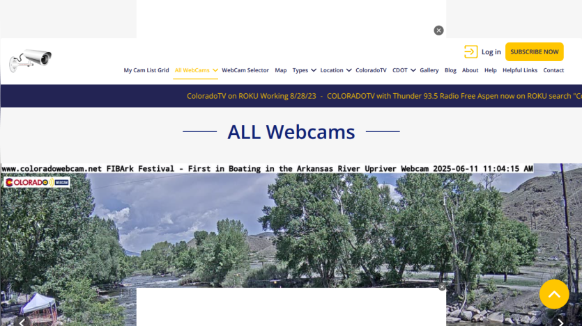 Webcam page showing live view of Arkansas River with trees and hills, navigation menu and subscription options