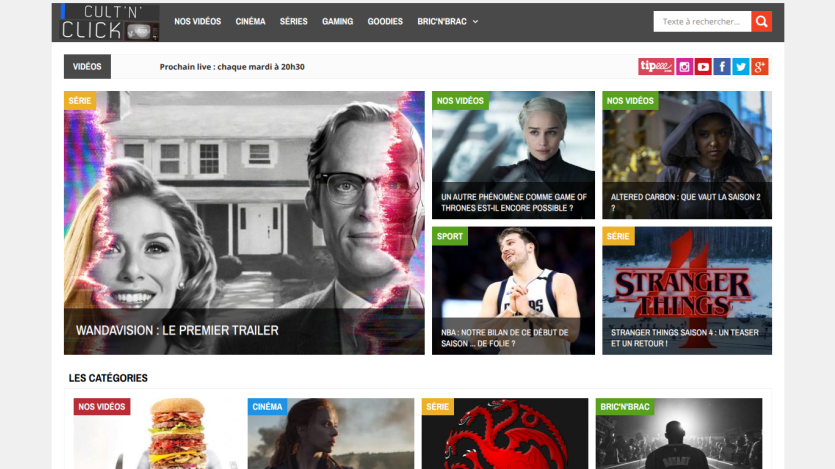 Homepage featuring latest trailers and categories for movies and shows.