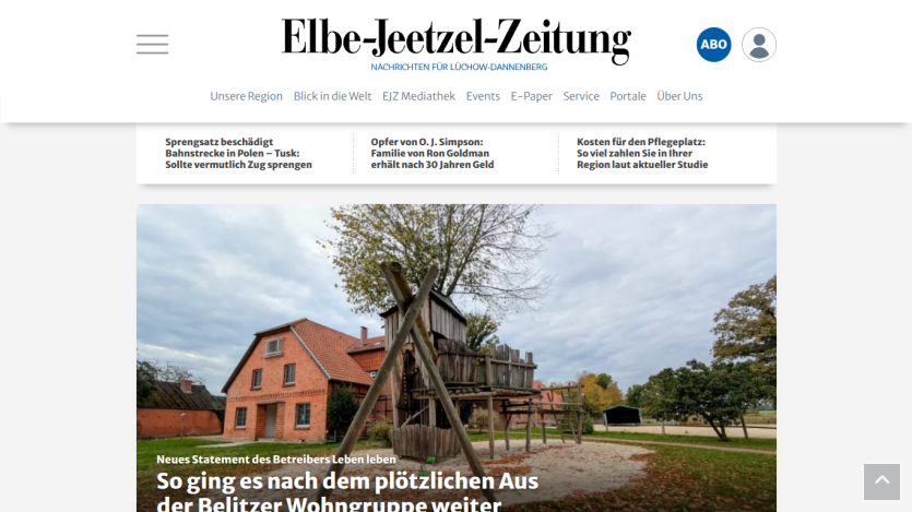 News website Elbe-Jeetzel-Zeitung with headline about Belitzer Wohngruppe and a large outdoor wooden play structure