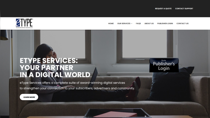 eType Services homepage with headline about digital services and a woman using a laptop on a sofa