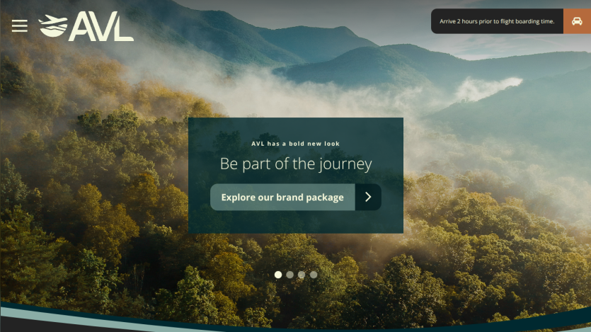 AVL website hero with mountainous forest background and call to explore brand package