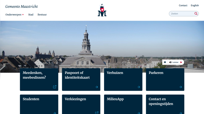 University website homepage with navigation menu and a cityscape hero image under a clear sky
