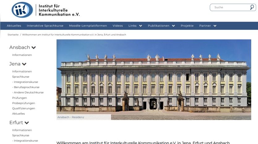 Homepage of the Institute for Intercultural Communication with a prominent building image and navigation menu.