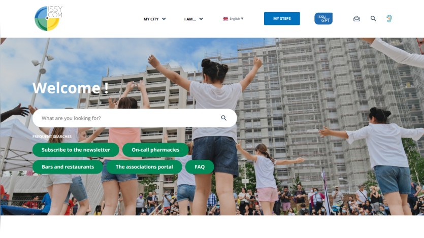City community website welcome page with children dancing outdoors and search bar for local information