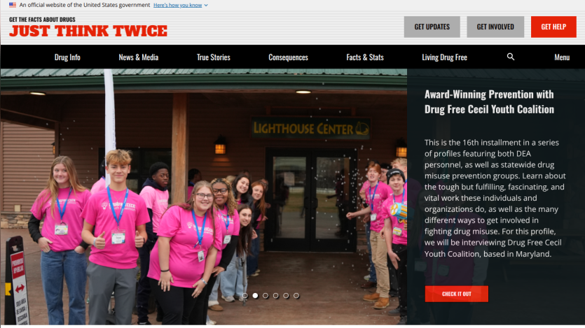 Homepage featuring a group in pink shirts promoting a drug-free coalition event.