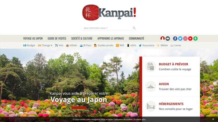Homepage of Kanpai! featuring travel tips for Japan with vibrant floral background.