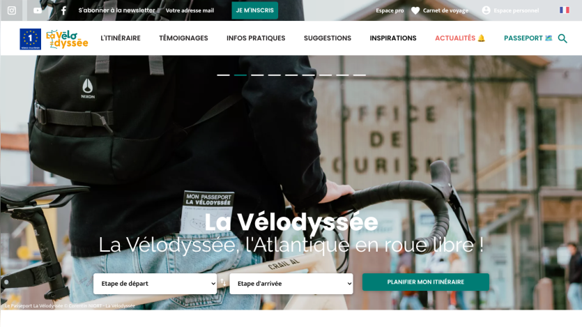 La Vélodyssée cycling route homepage with itinerary planning options and a background image of a cyclist with a backpack