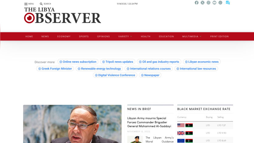 The Libya Observer homepage with news headlines, navigation menu, and a photo of a man speaking.