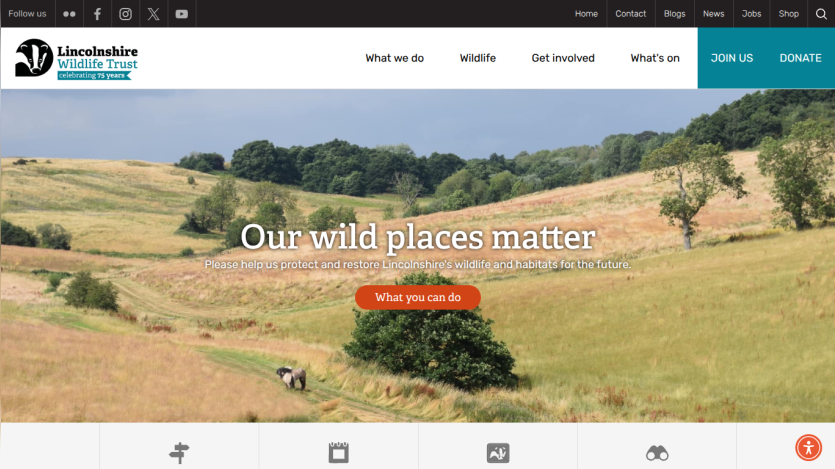 Lincolnshire Wildlife Trust homepage with a scenic landscape and call to action to protect wildlife