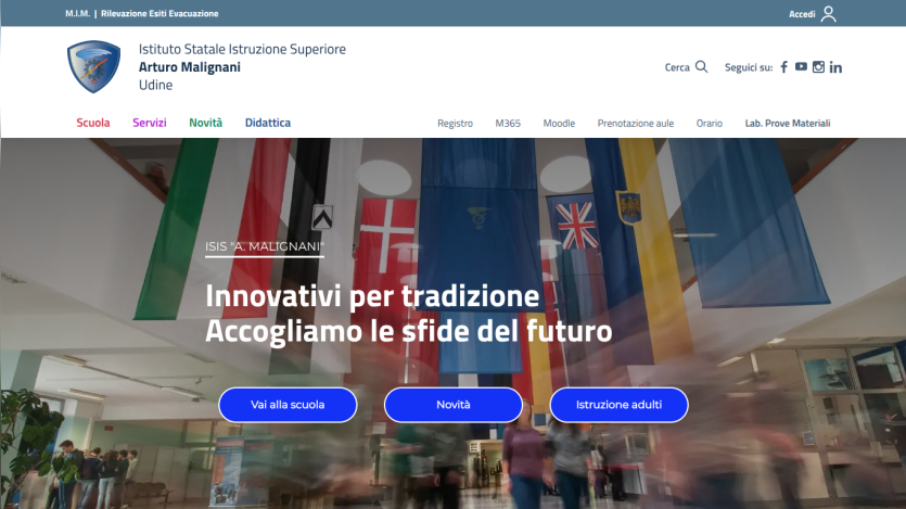 Homepage of a school featuring flags and buttons for news and education.