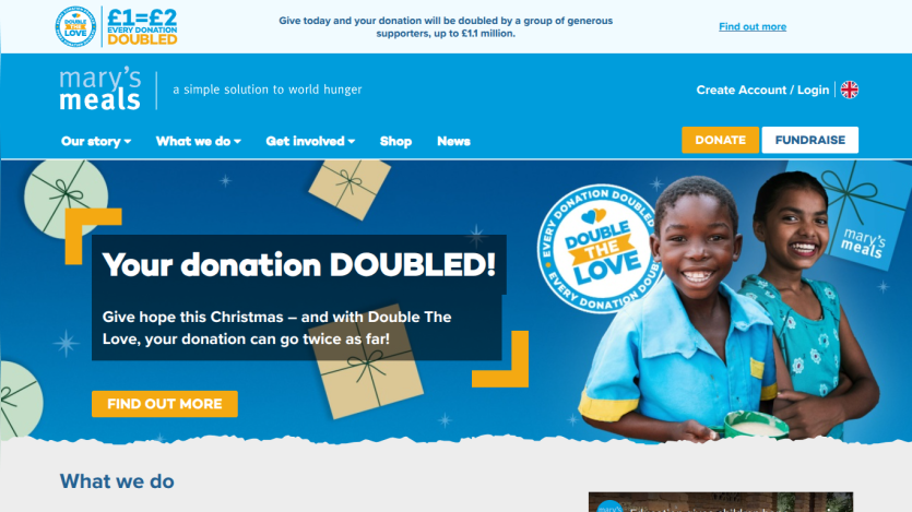 Mary's Meals homepage with donation matching campaign and smiling children, navigation menu, and call to action buttons