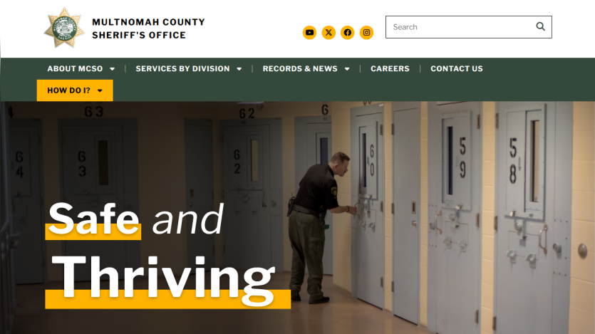 Multnomah County Sheriff's Office homepage with navigation and slogan Safe and Thriving over jail cell background