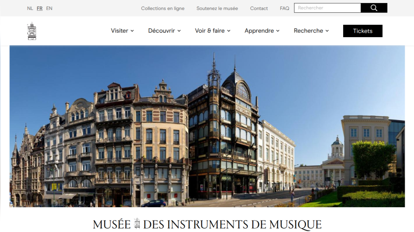 Homepage of Musée des Instruments de Musique with navigation menu and city street view hero image