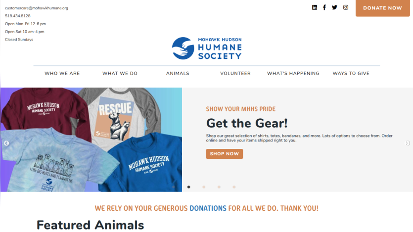 Homepage header with navigation menu and hero section featuring a promotional banner and call-to-action button